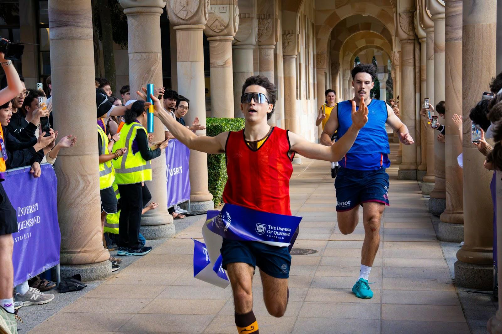 St John's student winning a race - find us on instagram