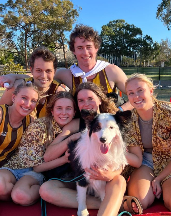 Students with the college dog